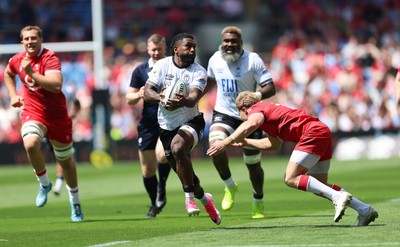 040726 - Fiji v Wales, Nations Championship - Frank Lomani of Fiji takes on Blair Murray of Wales