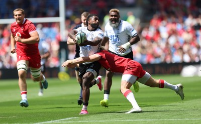 040726 - Fiji v Wales, Nations Championship - Frank Lomani of Fiji takes on Blair Murray of Wales