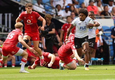 040726 - Fiji v Wales, Nations Championship - Selestino Ravutaumada of Fiji takes on Blair Murray of Wales