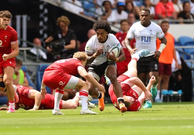 040726 - Fiji v Wales, Nations Championship - Selestino Ravutaumada of Fiji takes on Blair Murray of Wales