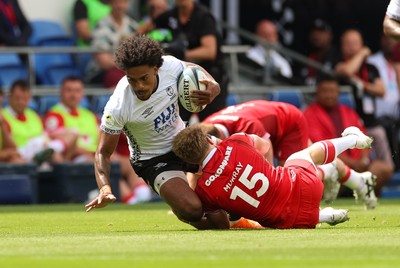040726 - Fiji v Wales, Nations Championship - Selestino Ravutaumada of Fiji takes on Blair Murray of Wales
