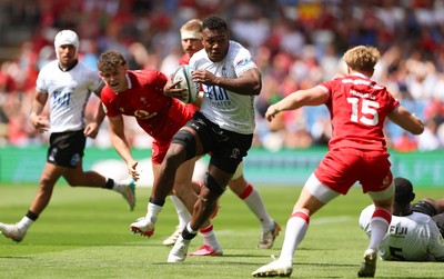 040726 - Fiji v Wales, Nations Championship - Elia Canakaivata of Fiji takes on Blair Murray of Wales