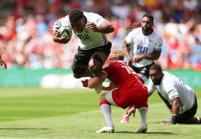 040726 - Fiji v Wales, Nations Championship - Elia Canakaivata of Fiji takes on Blair Murray of Wales