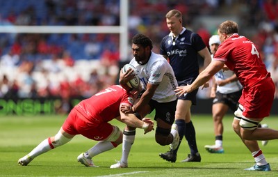 040726 - Fiji v Wales, Nations Championship - Kitione Salawa of Fiji takes on Jac Morgan of Wales and Ben Carter of Wales