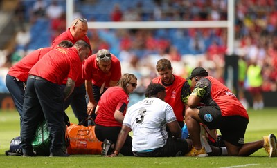 040726 - Fiji v Wales, Nations Championship - Tim Hoyt of Fiji receives treatment before leaving the pitch with an injury