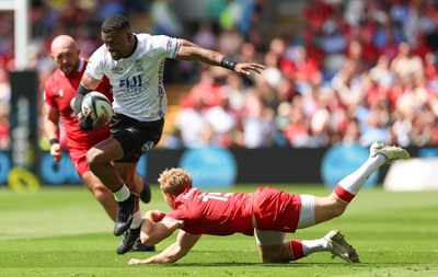040726 - Fiji v Wales, Nations Championship - Jiuta Wainiqolo of Fiji breaks away