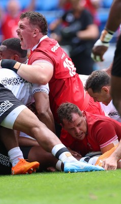 040726 - Fiji v Wales, Nations Championship - Ryan Elias of Wales powers over to score try