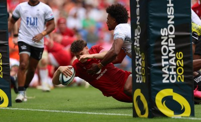 040726 - Fiji v Wales, Nations Championship - Eddie James of Wales dives in to score the final try