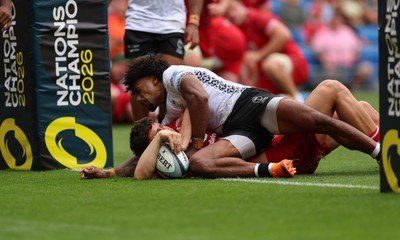 040726 - Fiji v Wales, Nations Championship - Eddie James of Wales dives in to score the final try