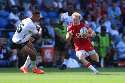 040726 - Fiji v Wales, Nations Championship - Blair Murray of Wales breaks away