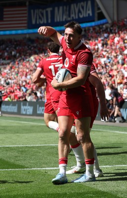 040726 - Fiji v Wales, Nations Championship - Josh Adams of Wales celebrates after scoring try