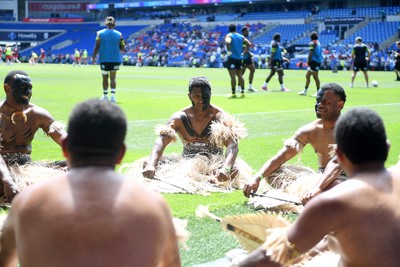 040726 - Fiji v Wales - Nations Championship - Fiji fans huddle before the match on the pitch