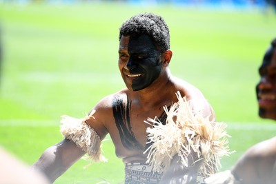 040726 - Fiji v Wales - Nations Championship - Fiji fans huddle before the match on the pitch
