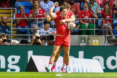 040726 - Fiji v Wales - Nations Championship - Josh Adams of Wales celebrates scoring a try with team mates