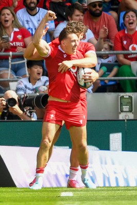 040726 - Fiji v Wales - Nations Championship - Josh Adams of Wales celebrates scoring a try with team mates