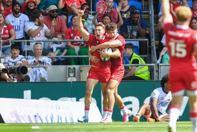 040726 - Fiji v Wales - Nations Championship - Josh Adams of Wales celebrates scoring a try with team mates