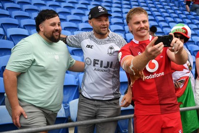 040726 - Fiji v Wales - Nations Championship - Aaron Wainwright of Wales with fans at full time