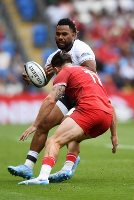 040726 - Fiji v Wales - Nations Championship - Vilimoni Botitu of Fiji is challenged by Josh Adams of Wales