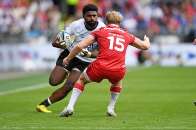 040726 - Fiji v Wales - Nations Championship - Kalaveti Ravouvou of Fiji is challenged by Blair Murray of Wales