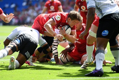 040726 - Fiji v Wales - Nations Championship - Dan Edwards of Wales is challenged by Kitione Salawa of Fiji