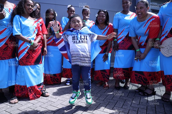 040726 - Fiji v Wales - Nations Championship - Fijian singers outside the stadium before the game