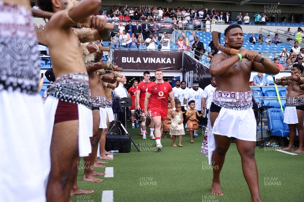 040726 - Fiji v Wales - Nations Championship - Dewi Lake of Wales leads the team out