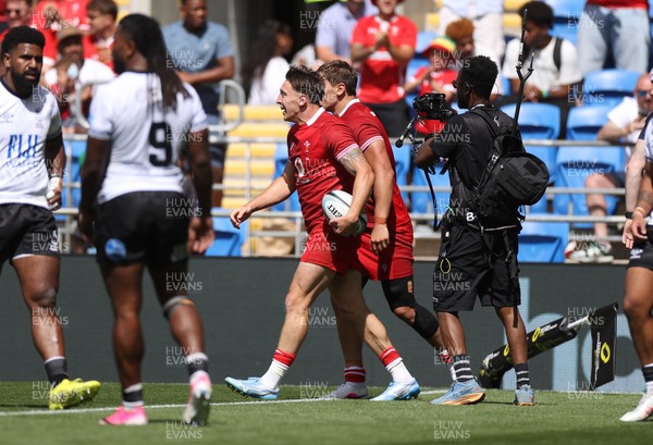 040726 - Fiji v Wales - Nations Championship - Josh Adams of Wales celebrates scoring a try