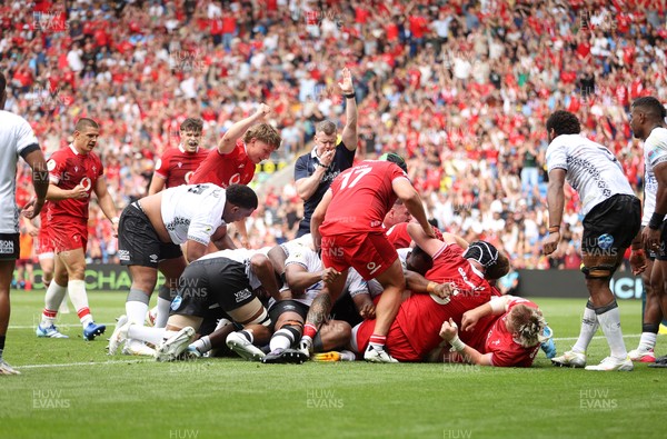040726 - Fiji v Wales - Nations Championship - Aaron Wainwright of Wales gets over the line to score a try