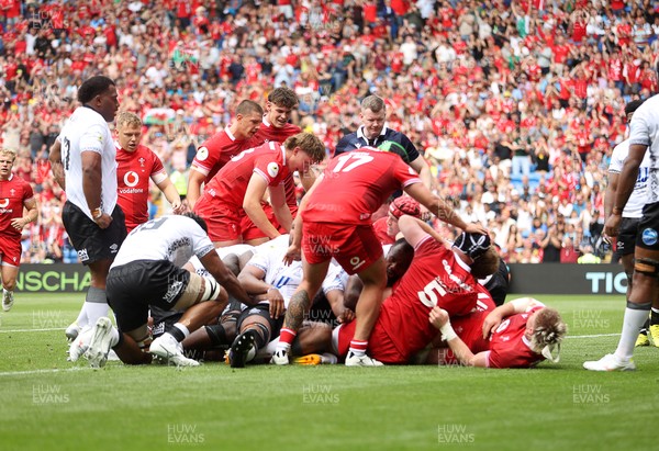 040726 - Fiji v Wales - Nations Championship - Aaron Wainwright of Wales gets over the line to score a try