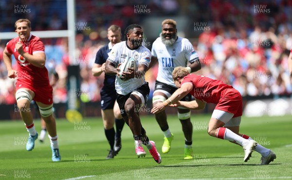 040726 - Fiji v Wales, Nations Championship - Frank Lomani of Fiji takes on Blair Murray of Wales