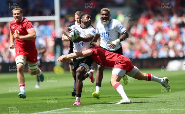 040726 - Fiji v Wales, Nations Championship - Frank Lomani of Fiji takes on Blair Murray of Wales