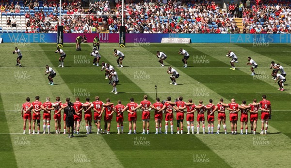 040726 - Fiji v Wales, Nations Championship - The Wales team face up to the Fijian Cibi ahead of kick off