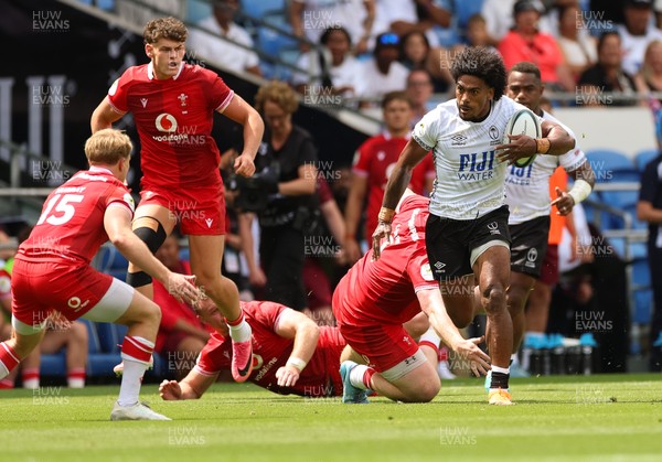040726 - Fiji v Wales, Nations Championship - Selestino Ravutaumada of Fiji takes on Blair Murray of Wales