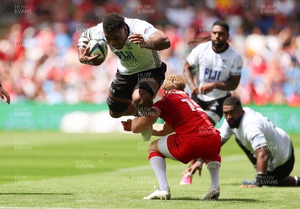 040726 - Fiji v Wales, Nations Championship - Elia Canakaivata of Fiji takes on Blair Murray of Wales