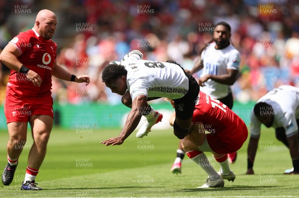 040726 - Fiji v Wales, Nations Championship - Elia Canakaivata of Fiji takes on Blair Murray of Wales