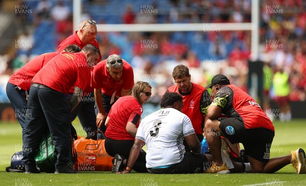 040726 - Fiji v Wales, Nations Championship - Tim Hoyt of Fiji receives treatment before leaving the pitch with an injury