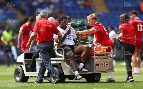 040726 - Fiji v Wales, Nations Championship - Tim Hoyt of Fiji receives treatment before leaving the pitch with an injury