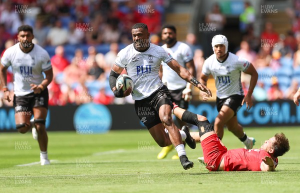 040726 - Fiji v Wales, Nations Championship - Jiuta Wainiqolo of Fiji breaks away