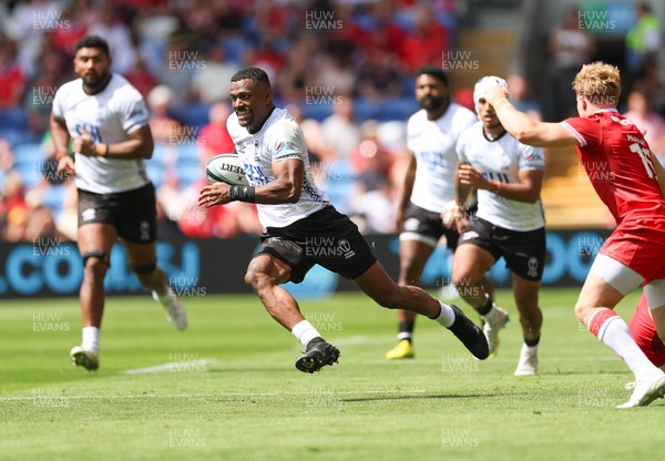 040726 - Fiji v Wales, Nations Championship - Jiuta Wainiqolo of Fiji breaks away
