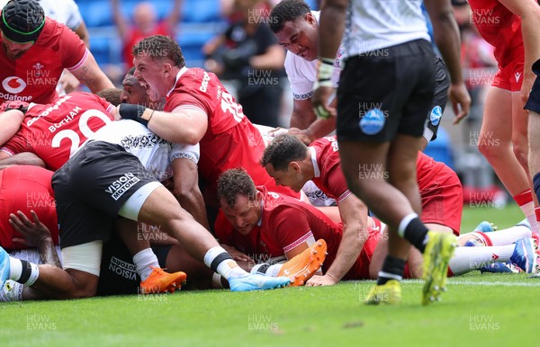 040726 - Fiji v Wales, Nations Championship - Ryan Elias of Wales powers over to score try