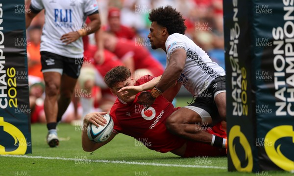 040726 - Fiji v Wales, Nations Championship - Eddie James of Wales dives in to score the final try