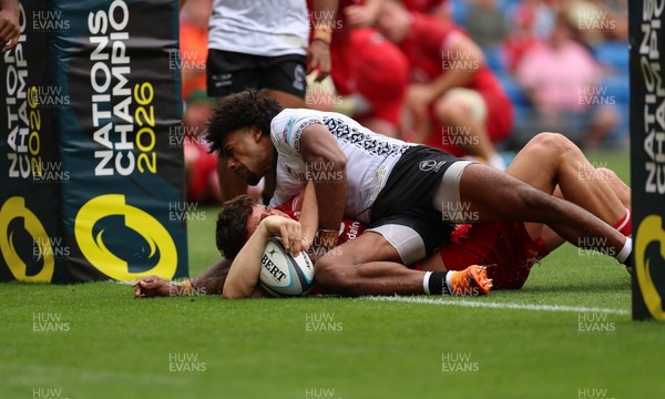 040726 - Fiji v Wales, Nations Championship - Eddie James of Wales dives in to score the final try