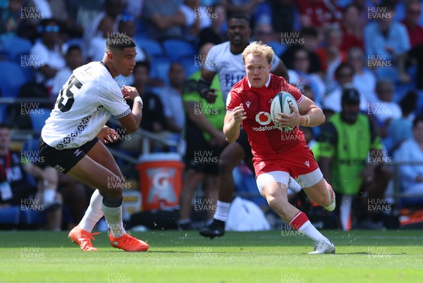 040726 - Fiji v Wales, Nations Championship - Blair Murray of Wales breaks away