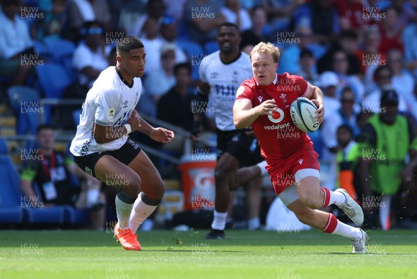 040726 - Fiji v Wales, Nations Championship - Blair Murray of Wales breaks away