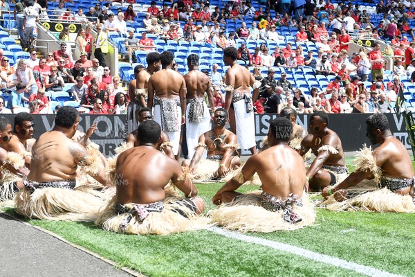 040726 - Fiji v Wales - Nations Championship - Fiji fans huddle before the match on the pitch