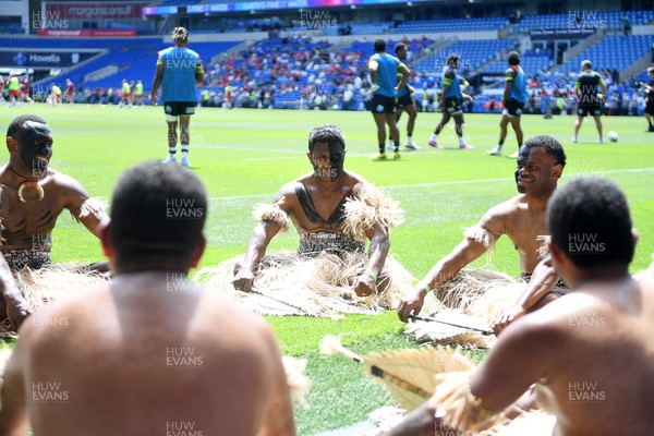 040726 - Fiji v Wales - Nations Championship - Fiji fans huddle before the match on the pitch