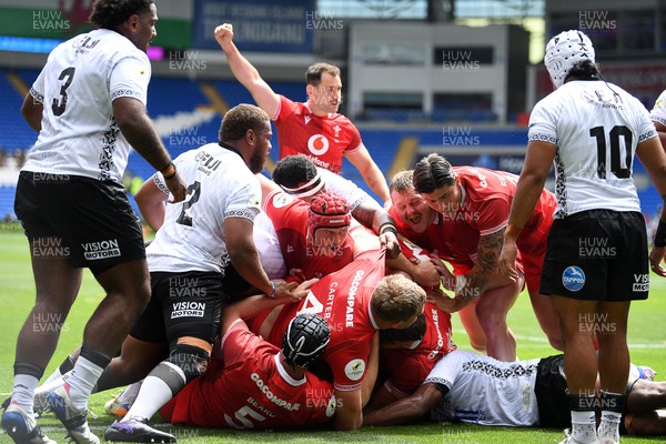 040726 - Fiji v Wales - Nations Championship - Wales power over to score a try