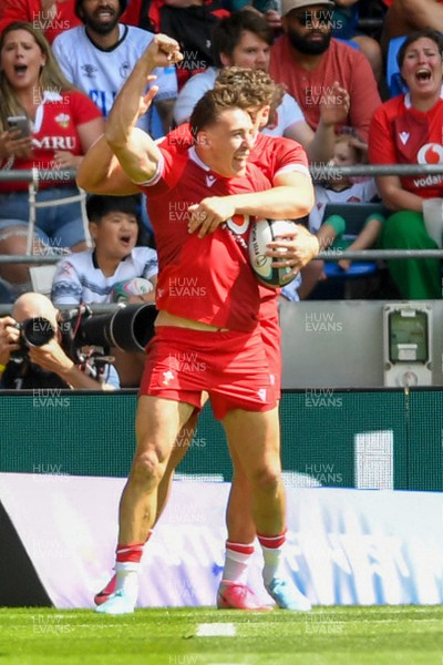 040726 - Fiji v Wales - Nations Championship - Josh Adams of Wales celebrates scoring a try with team mates