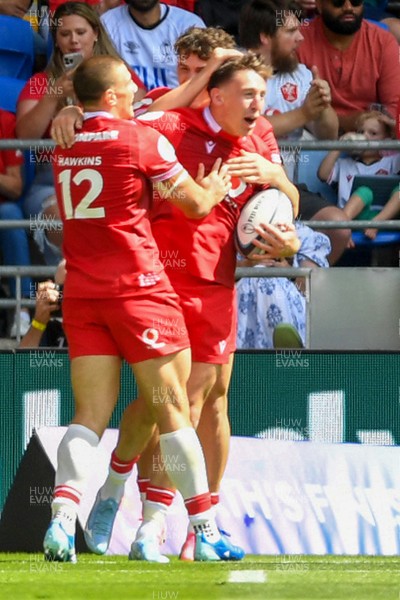 040726 - Fiji v Wales - Nations Championship - Josh Adams of Wales celebrates scoring a try with team mates