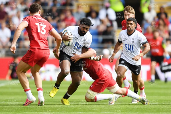 040726 - Fiji v Wales - Nations Championship - Kalaveti Ravouvou of Fiji is challenged by Eddie James of Wales